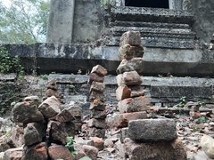 Stacked stones outside an old temple in Sangklaburi